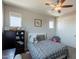 Light-filled bedroom with a ceiling fan, closet, neutral walls, and a cozy feel at 3871 E Harrison St, Gilbert, AZ 85295