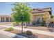 This home showcases a well-maintained lawn, desert landscaping, covered front porch, and a charming neighborhood setting at 3871 E Harrison St, Gilbert, AZ 85295