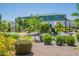 Community playground with shade, surrounded by attractive landscaping, offering a fun space for children at 3871 E Harrison St, Gilbert, AZ 85295