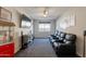 Theater room with comfortable seating, a large television, and a popcorn machine at 3871 E Harrison St, Gilbert, AZ 85295