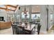 Bright dining area with large windows overlooking the pool and outdoor living space at 4332 N Santiago Cir, Mesa, AZ 85215