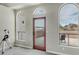 Sitting room featuring architectural windows, a telescope, and views of the outside at 4332 N Santiago Cir, Mesa, AZ 85215