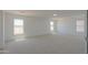 Large bonus room has carpet, recessed lighting, and plenty of space at 43601 W Cowpath Rd, Maricopa, AZ 85138