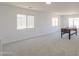 Bright and spacious game room with a pool table and ample natural light at 43601 W Cowpath Rd, Maricopa, AZ 85138