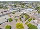 Neighborhood aerial showcasing lovely homes with desert landscaping, mature trees, and easy access to local streets at 6631 E Dallas St, Mesa, AZ 85205