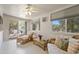 Sunroom featuring wicker furniture, large windows, and a ceiling fan at 6631 E Dallas St, Mesa, AZ 85205