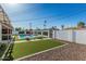 Spacious backyard features a pool, spa, lounge seating, turf, and low-maintenance landscaping at 8522 E Virginia Ave, Scottsdale, AZ 85257