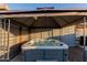A hot tub on a patio in a backyard with an enclosure at 8522 E Virginia Ave, Scottsdale, AZ 85257