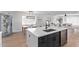 Gourmet kitchen features a stainless steel dishwasher, quartz countertops, designer faucet, and lots of storage at 8522 E Virginia Ave, Scottsdale, AZ 85257