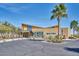 Modern community center with architectural details, landscaping, and ample parking at 10065 E Tiger Lily Ave, Mesa, AZ 85212