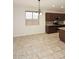 Open kitchen area featuring a breakfast bar and modern appliances with lots of space to cook at 10065 E Tiger Lily Ave, Mesa, AZ 85212
