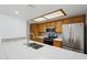 Modern kitchen with stainless steel appliances, quartz countertops, and tiled backsplash at 1021 S Greenfield Rd # 1077, Mesa, AZ 85206