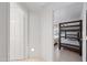 Bright bedroom features bunk beds and a large window at 10410 N Cave Creek Rd # 1100, Phoenix, AZ 85020