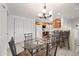 Eat-in dining room featuring glass table and kitchen bar at 10410 N Cave Creek Rd # 1100, Phoenix, AZ 85020