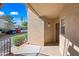 Exterior shot of the front entry featuring stucco siding and a security light at 10410 N Cave Creek Rd # 1100, Phoenix, AZ 85020