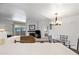 Open-concept with a fireplace, leading to an outdoor patio, and visible kitchen offering a relaxed atmosphere at 10410 N Cave Creek Rd # 1100, Phoenix, AZ 85020