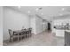 Cozy dining area with modern table, shiplap wall, and an open layout at 1104 E Tekoa Ave, Gilbert, AZ 85298