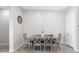 Bright dining room with neutral decor, shiplap wall, and comfortable seating at 1104 E Tekoa Ave, Gilbert, AZ 85298