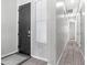 Clean entryway featuring tile flooring, a stylish black door, and neutral paint at 1104 E Tekoa Ave, Gilbert, AZ 85298