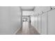 Inviting hallway featuring tile flooring, neutral paint, and convenient coat storage at 1104 E Tekoa Ave, Gilbert, AZ 85298