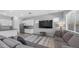Comfortable living room featuring a large sectional sofa, area rug, and mounted TV at 1104 E Tekoa Ave, Gilbert, AZ 85298