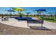 Community playground featuring a bench and ample play space, along with picnic tables and walking paths for residents to enjoy at 1104 E Tekoa Ave, Gilbert, AZ 85298