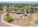 Aerial view of the playground featuring swings, slides, and climbing structures at 1104 E Tekoa Ave, Gilbert, AZ 85298