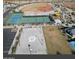 Aerial view of the community sports complex featuring basketball and tennis courts at 11562 W Levi Dr, Avondale, AZ 85323