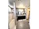 Modern bathroom features a double sink vanity, large shower, and neutral tones at 12950 W Cassia Trl, Peoria, AZ 85383