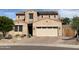 Beautiful two-story home featuring a well-maintained front yard and a spacious two car garage at 12950 W Cassia Trl, Peoria, AZ 85383