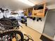 Tidy garage with overhead storage and ample space at 12950 W Cassia Trl, Peoria, AZ 85383