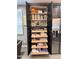 Well-organized pantry offers ample storage with adjustable shelves and wooden drawers at 12950 W Cassia Trl, Peoria, AZ 85383