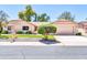 Charming single-story home with well-maintained lawn, desert landscaping and an attached two-car garage at 14151 W Yosemite Dr, Sun City West, AZ 85375