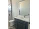Bathroom features a white countertop, vanity, and modern fixtures at 1519 N Etta St, Casa Grande, AZ 85122