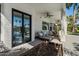 Charming patio with lounge chairs that lead to a delightful view of the pool and waterfront at 1539 W Laurel Ave, Gilbert, AZ 85233