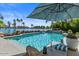 Sparkling pool with rock features and waterfront views, perfect for relaxation and entertaining outdoors at 1539 W Laurel Ave, Gilbert, AZ 85233