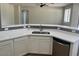 Bright kitchen featuring quartz countertops, stainless steel appliances, and a breakfast bar at 15461 W Jefferson St, Goodyear, AZ 85338