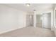 Bright bedroom featuring carpeted flooring, fresh white walls, and a sliding closet at 1550 S Chaparral Blvd, Gilbert, AZ 85296