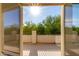Bright patio features stucco walls, dark wrought iron railing and a scenic view at 1550 S Chaparral Blvd, Gilbert, AZ 85296