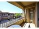 Balcony overlooking a serene residential area, offering a peaceful outdoor escape and neighborhood views at 16420 N Thompson Peak Pkwy # 2020, Scottsdale, AZ 85260