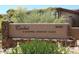 A neighborhood sign for Cachet at McDowell Mountain Ranch with desert landscaping at 16420 N Thompson Peak Pkwy # 2020, Scottsdale, AZ 85260