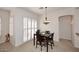 Dining area featuring a modern light fixture, ample natural light, and a cozy atmosphere at 16420 N Thompson Peak Pkwy # 2020, Scottsdale, AZ 85260