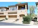 Inviting townhouse with a private garage and desert landscaping at 16420 N Thompson Peak Pkwy # 2020, Scottsdale, AZ 85260