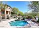 Hot tub at a community pool with lush landscaping and mature shade trees at 16420 N Thompson Peak Pkwy # 2020, Scottsdale, AZ 85260