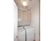 Functional laundry area with a washer, dryer, and cabinets for storage, maximizing space efficiency at 16420 N Thompson Peak Pkwy # 2020, Scottsdale, AZ 85260