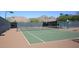 Well-maintained tennis court with mountain views and lighting for evening play at 16420 N Thompson Peak Pkwy # 2020, Scottsdale, AZ 85260