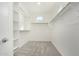 Walk-in closet with built-in shelving and ample storage space at 17736 W Cassia Way, Goodyear, AZ 85338