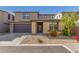 Charming two-story home featuring a two-car garage and landscaped front yard with stone accents at 17736 W Cassia Way, Goodyear, AZ 85338
