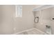 Laundry room with tile flooring, washer and dryer hookups, and white walls at 17736 W Cassia Way, Goodyear, AZ 85338