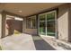 Covered patio with ample space for outdoor entertaining at 17736 W Cassia Way, Goodyear, AZ 85338